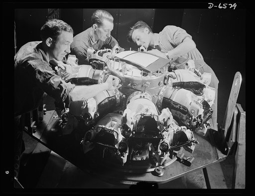 Production. Pratt and Whitney airplane engines. Cylinders are installed on power section assemblies of a new Pratt and Whitney airplane engine produced in a large Eastern plant now engaged exclusively in supplying the planes of our air forces with excellent American power installations. Pratt and Wh