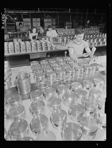 Production. Pratt and Whitney airplane engines. Installing rings on pistons for Pratt and Whitney airplane engines in a large Eastern plant. The pistons, the rings, and the cylinders in which they will be fitted, are built to the finest American standards. Pratt and Whitney Aircraft