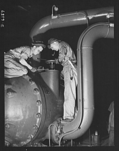 Production. New Tennessee Valley Authority synthetic ammonia plant. Adjusting a valve servicing one of the gas compressors in the TVA's new synthetic ammonia plant in the Muscle Shoals area. Ammonia is made here by the high-pressure synthesis of nitrogen and hydrogen. The ammonia thus secured is con