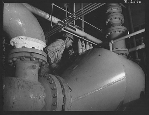 Production. New Tennessee Valley Authority synthetic ammonia plant. Making a pipe joint on a liquid vaporizer in the TVA's new synthetic ammonia plant in the Muscle Shoals area. Ammonia is made here by the high-pressure synthesis of nitrogen and hydrogen. The ammonia thus secured is converted at Mus