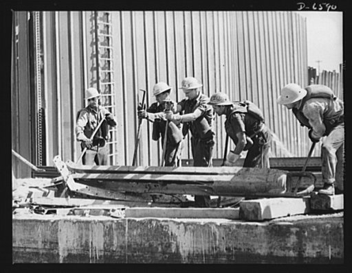 Tennessee Valley Authority power and conservation. Fort Loudoun Dam construction. A crew of huskies at work near the cofferdam of the new Fort Loudoun Dam, furthest upsteam of the TVA's main Tennessee River projects. Scheduled for closure and first storage of water early in 1943, this dam will creat