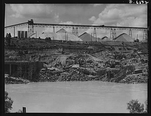 Tennessee Valley Authority power and conservation. Fort Loudoun Dam construction. Aggregate storage pile which provides crushed stone and sand for the building of the new Fort Loudoun Dam, furthest upstream of the TVA's main Tennessee River projects. Scheduled for closure and first storage of water 