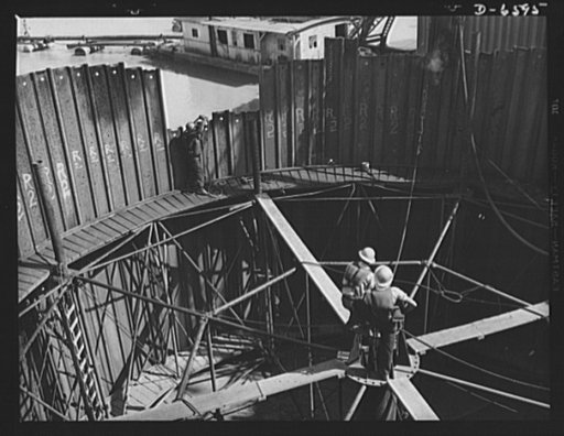 Tennessee Valley Authority power and conservation. Fort Loudoun Dam construction. Working inside the sheet steel wall of the cofferdam at the new Fort Loudoun Dam, Furthest upstream of the TVA's main Tennessee River projects. Scheduled for closure and first storage of water early in 1943, this dam w