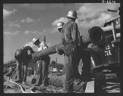 Tennessee Valley Authority power and conservation. Fort Loudoun Dam construction. Pipe fitters lay a new line at Fort Loudoun Dam, furthest upstream of the TVA's main Tennessee River projects. Scheduled for closure and first storage of water in 1943, this dam will create a 15,000-acre lake reaching 