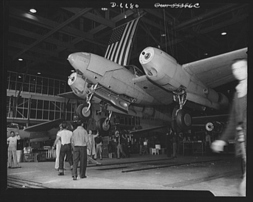 Production. Lockheed P-38 pursuit planes. Another new Lockheed P-38 pursuit ship leaves the main assembly line of a large Western aircraft plant. The station stand has been swept clear and the ship is being lowered away to rest on its own wheels. From here it will be rolled to a test field where pro