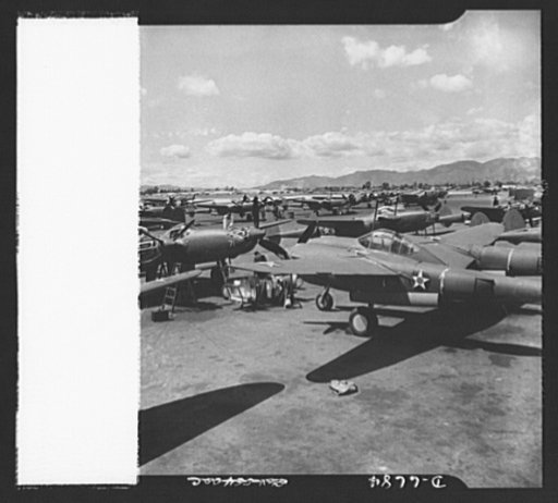 Production. Lockheed P-38 pursuit planes. Lockheed P-38 pursuit ships are made ready for test flights at a large Western aircraft plant. These planes, powered by twin Allison liquid-cooled engines, have performed brilliantly in action, notably in the Aleutians. The P-38 has long range and great fire