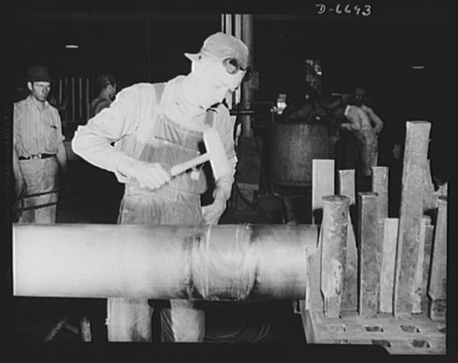 Manpower. Southern shipyard workers. A grocery store manager for thirteen years, C.R. Summers now is a sheet metal worker in a Southern Navy yard. Following a short training course in this work, he became adept at the job shown here, brazing on the sleeves that join lengths of copper tubing for Navy