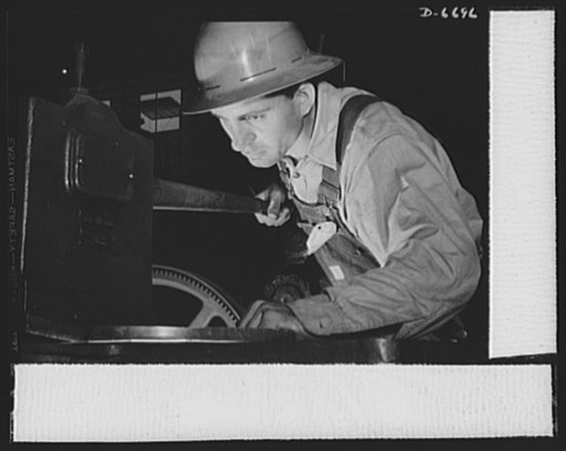 Manpower. Southern shipyard workers. R.W. Hollamon works at gap shears in his wartime job at a Southern Navy yard. In peacetime he was a farmer, but he has converted his skill to turning out ship parts for the U.S. Navy for the duration
