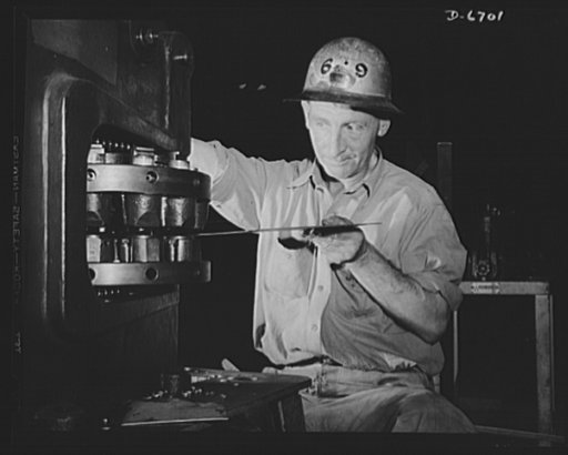Manpower. Southern shipyard workers. Back in harness. F.B. Neigel was one of many men skilled in sheet metal work who was unable, before the war, to find work in line with his early training. Now he is back at his old trade in a Southern Navy yard, and handling a forming machine as capably as ever
