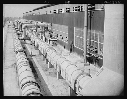 Production. Tin smelting. Long tubes carry all the smoke thrown off by the furnaces of a Southern tin smelter to Cottrell precipitator units. Here all tin carried in the smoke is removed by an electrical current of 65,000 volts, and added to the metal secured more directly in other stages of the pro