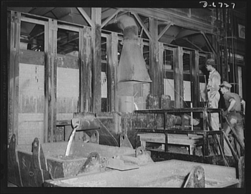 Production. Tin smelting. Tapping the furnace of a Southern tin smelter in which pure tin is extracted from the raw ore of South American mines. Here tin is drawn off into floats which weigh about eighteen tons when filled. The metal is then conveyed to polling kettles, where dross or skimmings are 