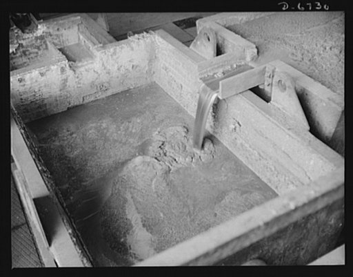 Production. Tin smelting. Tapping the furnace of a Southern tin smelter in which pure tin is extracted from the raw ore of South American mines. Here tin is drawn off into floats which weigh about eighteen tons when filled. The metal is then conveyed to polling kettles, where dross or skimmings are 