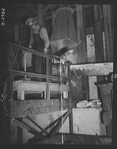 Production. Tin smelting. A sample of slag from one of the furnaces of a Southern tin smelting plant is tested to determine its tin content. After it has cooled, the sample is sent to the plant laboratory for analysis. At this smelter, the most modern plant of its kind in the world, pure tin is extr