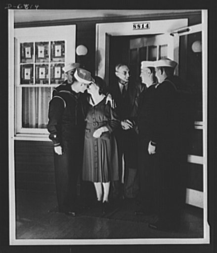 Thanksgiving, 1942. Four of Mr. and Mrs. Wayman E. Fincham's six warrior sons return to their home in Silver Spring, Maryland, for Thanksgiving. Five of the brothers joined the Coast Guard and the other enlisted in the Army. The oldest brother is with Uncle Sam's fighting forces overseas, and the yo
