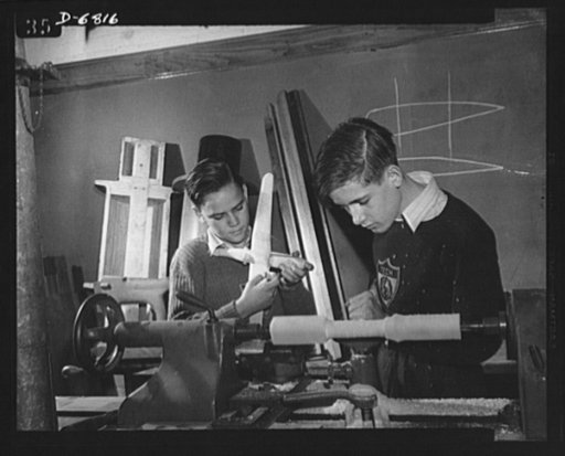 High school Victory Corps. Donald Alman (left) and Melvin E. Lenox, students at McKinley Technical High School, Washington, D.C., build model planes for the Navy's use in training military and civilian personnel. McKinley is one of 6,000 schools throughout the country which provides facilities for p