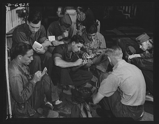 Training. Ramp boats. A class of young Marines learning the art of handling ramp boats and other invasion craft. The classroom was once part of the display rooms of a well know Southern boat builder. At its various yards this company is now making torpedo boats and barges, some large enough to land 