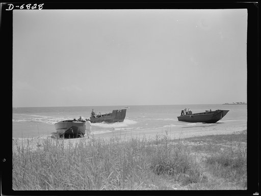 Training. Ramp boats. Marines in training at a Southern point learn the technique of landing men and equipment with ramp boats. The squared-ended craft coming in is a ramp boat, a thirty-six-footer made of wood and capable of setting troops and lighter vehicles and guns ashore at beach positions. Th