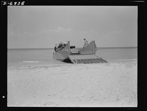 Training. Ramp boats. The Marines prepare to set a truck ashore from a fifty-foot ramp boat at a Navy school conducted by the Southern shipyard at which the boat was made. When the ramp is raised it closes tightly against the boat, making it entirely seaworthy. Higgins Industries