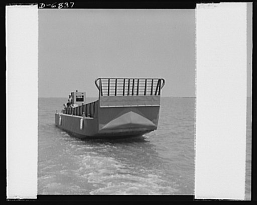 Production. Fifty-foot steel ramp boats. A fifty-foot steel ramp boat, just completed at a Southern boatyard, makes a trial run. Boats of this kind are used in making beach landings of men, tanks, and other equipment on hostile shores. The yard is also making torpedo boats, smaller wooden ramp boats