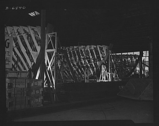 Production. Motor torpedo boats (wooden). Wooden motor torpedo boats for the Navy are built of prefabricated parts and sections in a large Southern shipyard. These fast seventy-eight-footers are built under roof and moved to a nearby waterway for launching and fitting. Higgins Industries