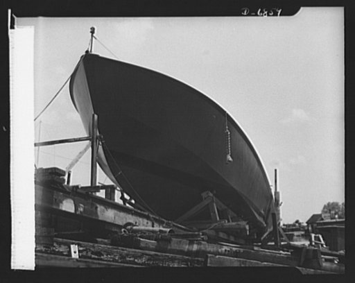 Production. Motor torpedo boats (wooden). A new seventy-eight-foot wooden torpedo boat ready for launching at a Southern shipyard. It was built indoors, of prefabricated parts and sections, and is now being moved to nearby water