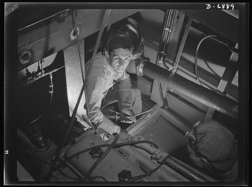 Production. Fifty-foot steel ramp boats. Mounting the power plant of a fifty-foot steel ramp boat in a Southern boatyard. This ramp boat, which will be used in landing men, tanks and other equipment on hostile shores, is powered by twin diesel engines. At this same boat yard are made torpedo boats, 