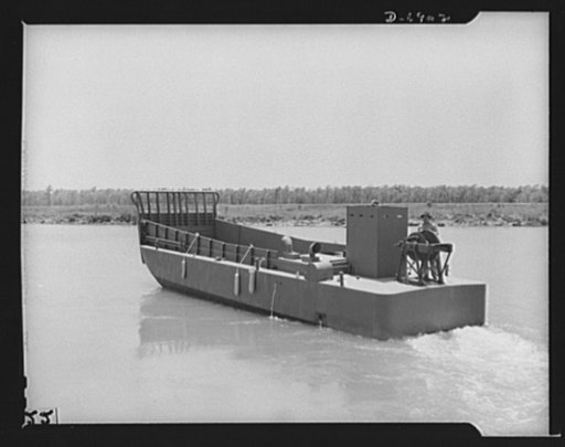 Production. Fifty-foot steel ramp boats. A fifty-foot steel ramp boat, just completed at a Southern boatyard, makes a trial run. Boats of this kind are used in making beach landings of men, tanks, and other equipment on hostile shores. The yard is also making torpedo boats, smaller wooden ramp boats