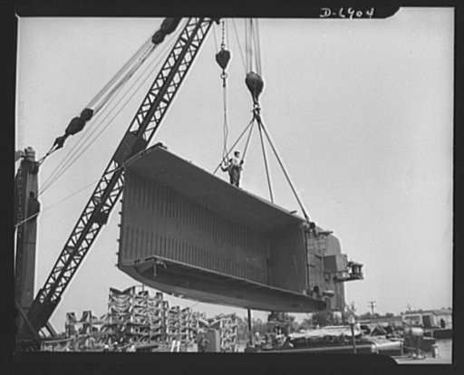 Production. Fifty-foot steel ramp boats. A new fifty-foot steel ramp boat, which has just passed its trial runs at a Southern boatyard, is removed from the water to be prepared for railroad shipment. Boats of this kind are used in making beach landings of men, tanks and other equipment on hostile sh