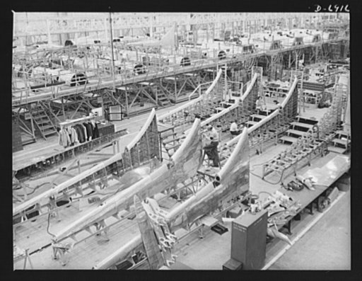 Production. B-17F heavy bombers. Dorsal fins for B-17F heavy bombers, America's killer whales of the air, ready for the assembly line at the Long Beach, California plant of the Douglas Aircraft Company. Better known as the "Flying Fortress," the B-17F is a later model of the B-17 which distinguished
