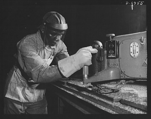 Production. B-25 bombers. Shaping parts for B-25 bombers in a router jog at a big Western plant. General Doolittle, who flew in a B-25 in the raid on Tokyo, has called this ship the best military plane in existence. The worker is typical of thousands of men and women who were quickly trained at this