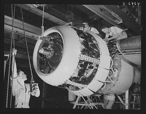 Production. B-25 bombers. Mounting a 1700-horsepower Wright Whirlwind engine to the fire wall of a B-25 bomber in a Western aircraft plant. This engine is one of the two powerful units which carry the B-25 through brilliant performances up to altitudes of 25,000 feet. General Doolittle has called th