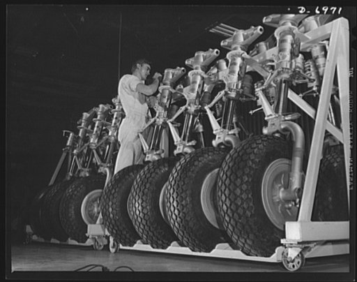 Production. B-25 bombers. Nose wheels for B-25 bombers racked up on conveyors that will carry them to assembly lines in a Western aircraft plant. General Doolittle has called the ship the best military plane in existence. With plenty of speed, a 1700-mile cruising range and a ceiling of 25,000 feet,