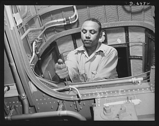 Production. B-25 bombers. Attaching a section of conduit in the navigator's compartment of a B-25 bomber in a Western aircraft plant. General Doolittle has called the ship the best military plane in existence. With plenty of speed, a 1700-mile cruising range and a ceiling of 25,000 feet, it has perf