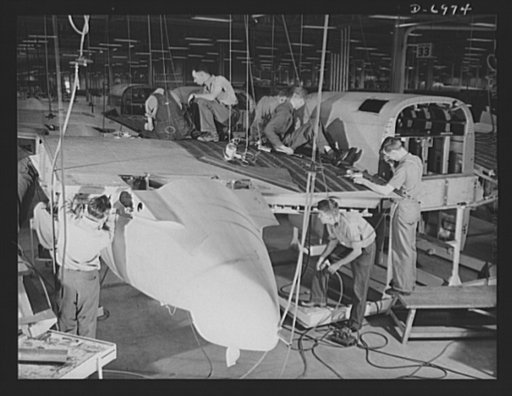 Production. B-25 bombers. Center section assembly line of a Western aircraft plant producing B-25 bombers. General Doolittle, who flew in a B-25 in the raid on Tokyo, has called the ship the best military plane in existence. With plenty of speed, a 1700- mile cruising range and a ceiling of 25,000 f