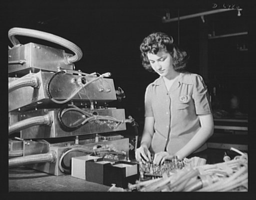 Production. B-25 bomber. Terminals are attached to the panel of an electrical junction box for a B-25 bomber. Part of the complicated electrical wiring system centers in this box. The Western plant in which this warship of the air is built employs many women at jobs that once were considered exclusi