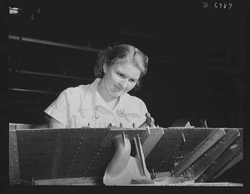 Production. B-25 bombers. Setting rivets in a frame member for a B-25 bomber. The Western plant in which thousands of these warships of the air are built employs many women at jobs that once were considered exclusively the work of men. Fairfax bomber plant, Kansas City