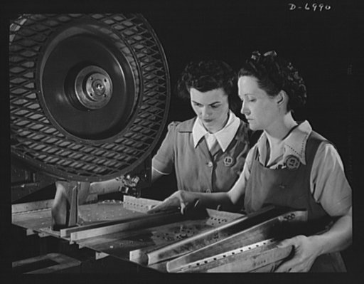 Production. B-25 bombers. Punching rivet holes in a frame member for a B-25 bomber. The Western plant in which thousands of these warships of the air are built employs many women at jobs that once were considered exclusively the work of men. Fairfax bomber plant, Kansas City