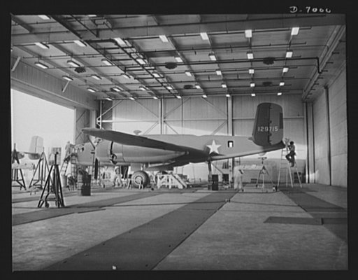 Production. B-25 bombers. A new B-25 medium bomber ready to leave the hanger at a Western aircraft plant for test flights that will determine whether it meets the Army's high standards. General Doolittle, calls it the best military plane in existence Fairfax bomber plant, Kansas City