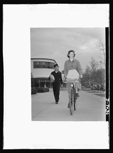 I'll carry mine. Two excellent methods of bringing home the family purchases: carry'em or pedal'em home by bicycle to conserve the tires and gasoline of your merchant's delivery trucks