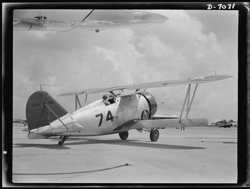 Naval air base, Corpus Christi, Texas. The motor gunned, connections intact, the Navy fighter F3F are constantly reconditioned by sailor mechanics at the base