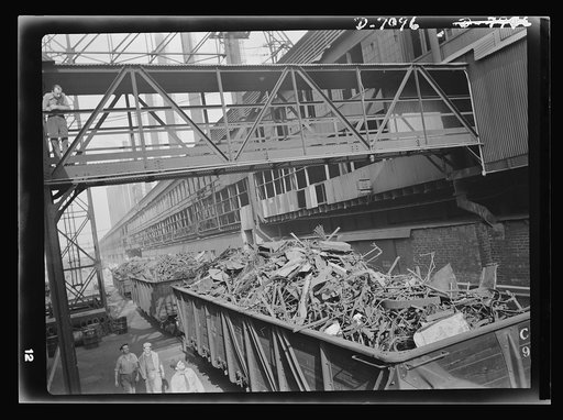 Salvage. Scrap for steel mills. Graded scrap metal, collected from Midwest homes and farms, is received at a Chicago steel mill where it will be processed into weapons of war