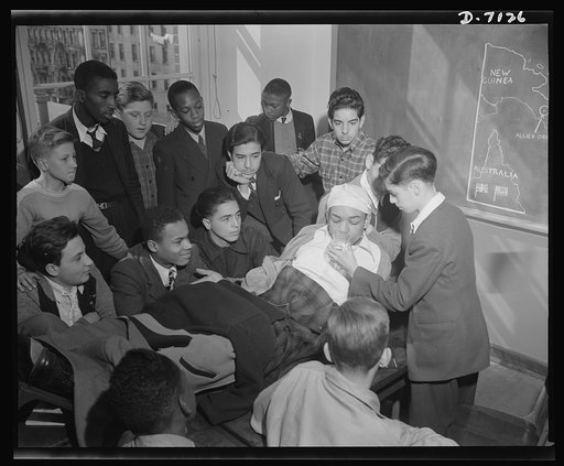 High school Victory Corps. Along with their English course, this class at Bejamin Franklin High School in New York City is learning the basic principles of first aid. Instruction is received from their English teacher, who has been certified by the Red Cross to teach first aid