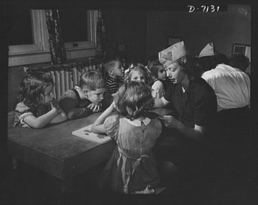High school Victory Corps. To release housewives in Silver Spring, Maryland, for war work, girls in the Victory Corps of Montgomery Blair High School operate a day nursery. Besides helping the community, the project ties in with the school's home economics course
