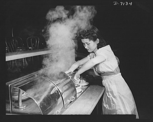 High school Victory Corps. Home economics students at Montgomery Blair High School, Silver Spring, Maryland, do their part in the school's Victory Corps program by preparing and serving food at cost in the student run cafeteria