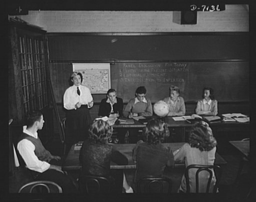High school Victory Corps. Young Americans study the problems of Democracy at war to prepare them for their future usefulness to their country. This panel discussion on inflation is typical of those held in social studies classes at Montgomery Blair High School, Silver Spring, Maryland, in which mem