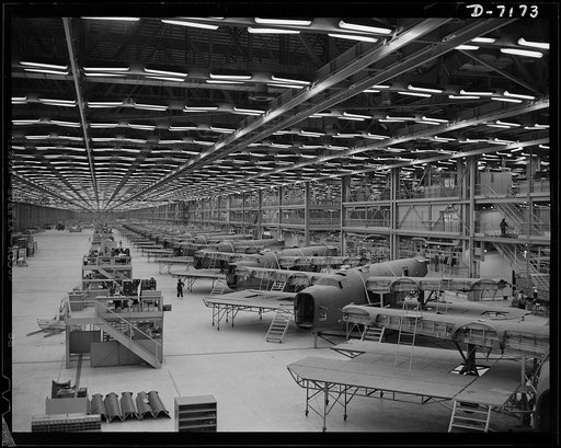 Production. B-24 bombers and C-87 transports. Half down the final line of a Western aircraft plant at which consolidated B-24 bombers and transports are made. This new transports, an adaptation of the B-24 bomber, is known as the C-87 and carries one of the greatest human or cargo loads of any plane
