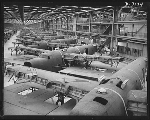 Production. B-24 bombers and C-87 transports. One-fourth of the way down the assembly line of Western aircraft plant making consolidated B-24 bombers and transports. This new transports, an adaptation of the B-24 bomber is known as the C-87, and carries one of the greatest human or cargo loads of an