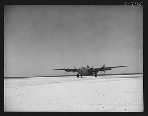 Production. B-24 bombers and C-87 transports. A new consolidated transport, just off the assembly line of a Western plant, taxies away from the flight hangar toward the flight runway for a takeoff. This new warship of the air is capable of high altitudes and over great ranges for high accuracy bombi