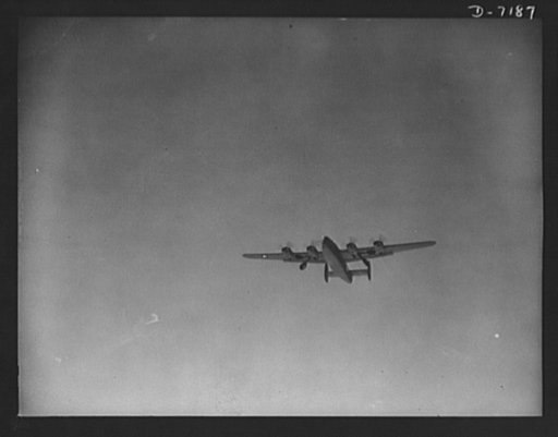 Production. B-24 bombers and C-87 transports. Just off the assembly line of a western plane, a new consolidated transport makes its maiden flight. The landing wheels are being retracted as the plane soars. This new transport, an adaptation of the B-24 bomber, is known as the C-87, and carries one of