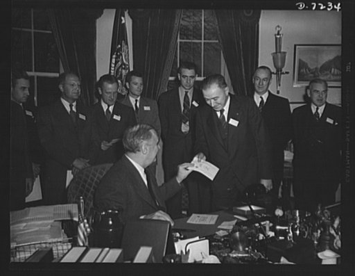 Citation winners. President Roosevelt, shown awarding a Certificate to Herbert R. James, an employee of the Christy Park Works, National Tube Company, McKeesport, Pennsylvania